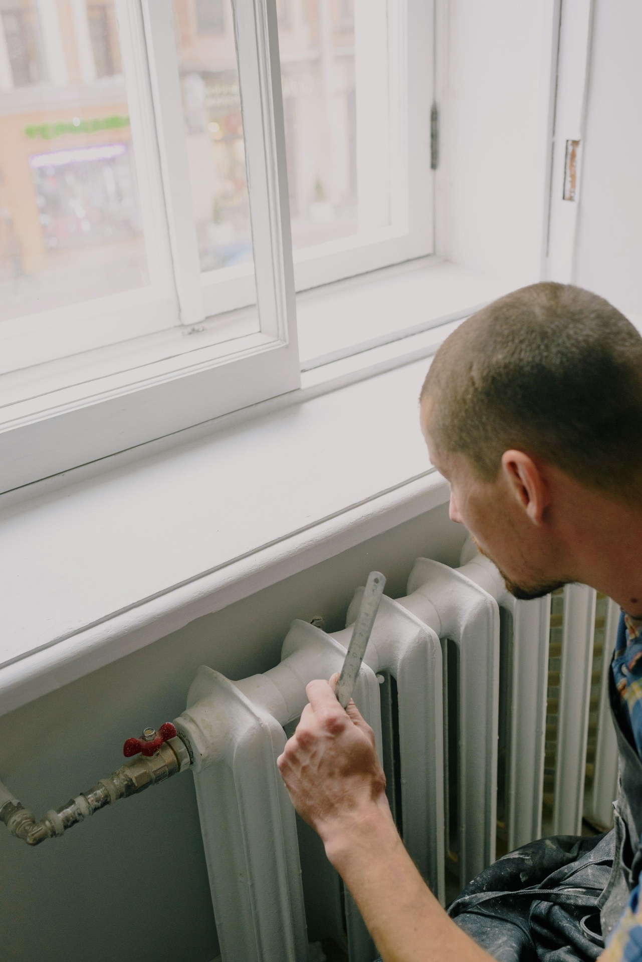 Tradesperson taking a customer call outside a home — organic Google search SEO